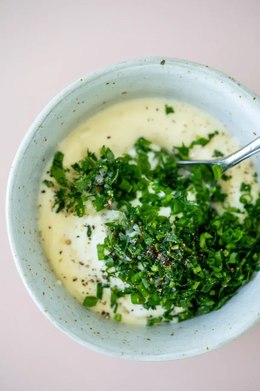 Combining Creamy Garlic and Herb Dipping Sauce Ingredients
