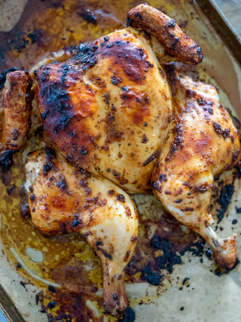 Freshly baked Portuguese chicken just out of the oven.