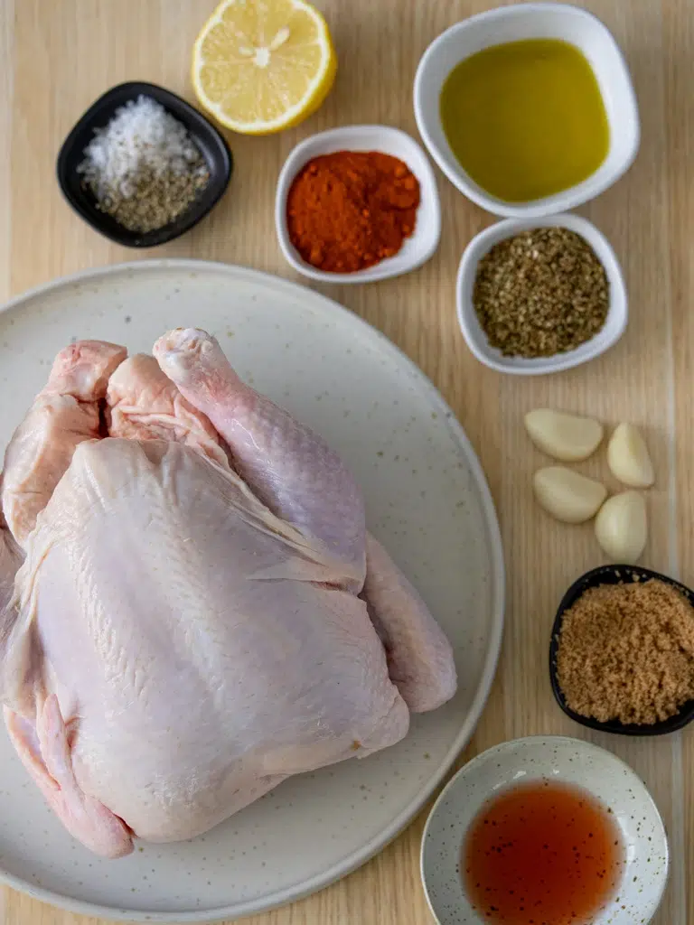 Ingredients laid out for Portuguese chicken recipe.